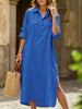 Blue FJØRNA lapel button side slit casual midi dress with a relaxed fit and stylish design, displayed on a hanger.