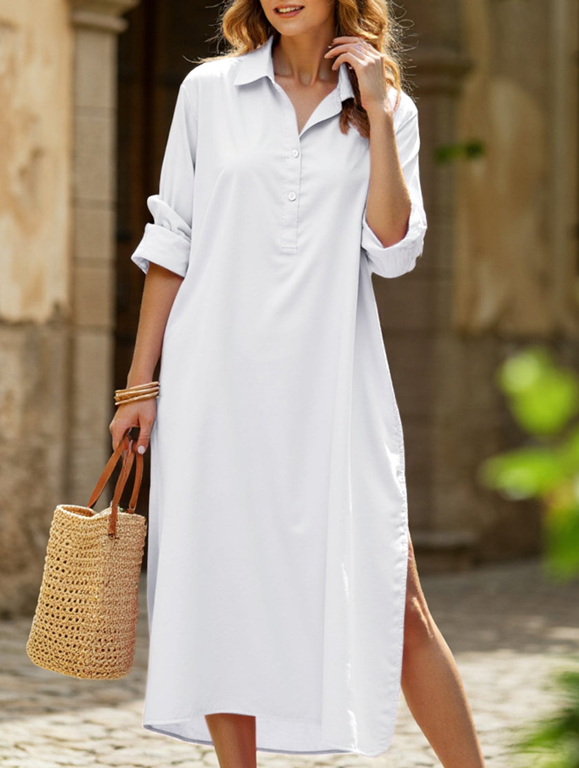 White FJØRNA casual midi dress with lapel button detail and side slit, featuring a relaxed, stylish fit.