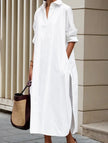 White FJØRNA lapel button side slit casual midi dress displayed on a hanger with front view.