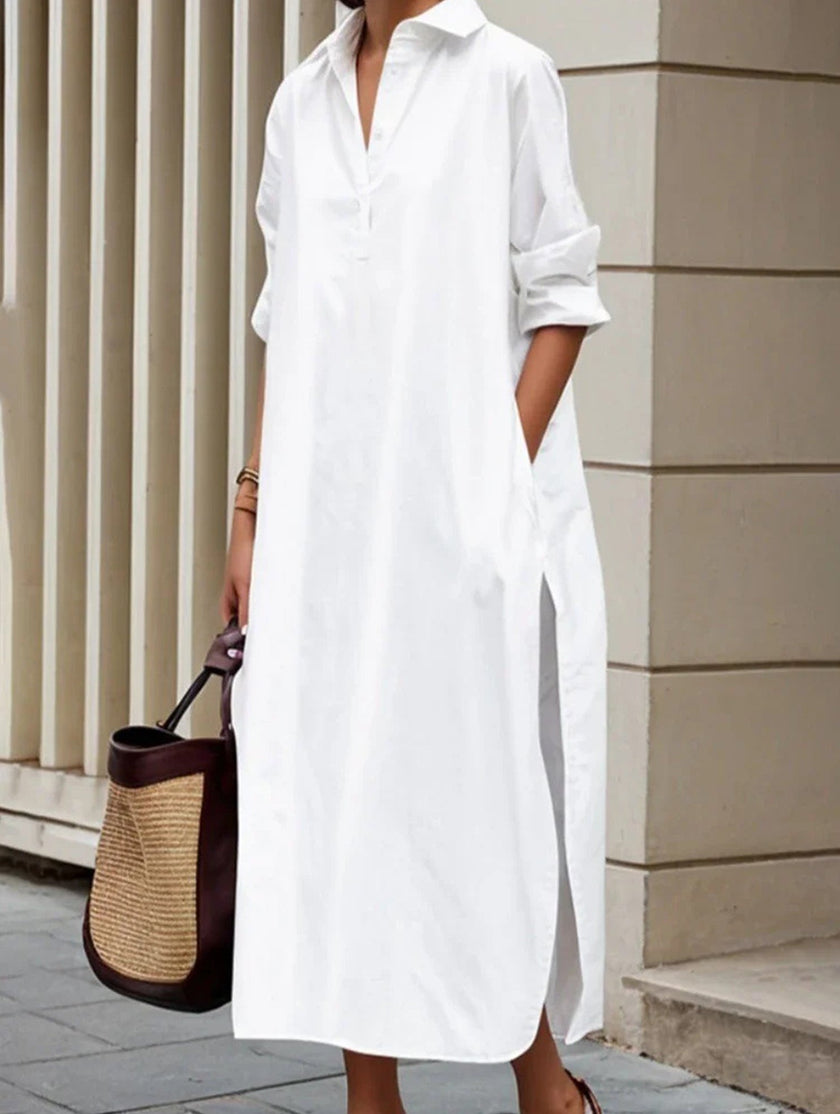 White FJØRNA lapel button side slit casual midi dress displayed on a hanger with front view.
