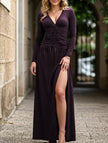 FJØRNA retro deep V long sleeve maxi dress in white, flowing design with a fitted waist and full-length skirt.