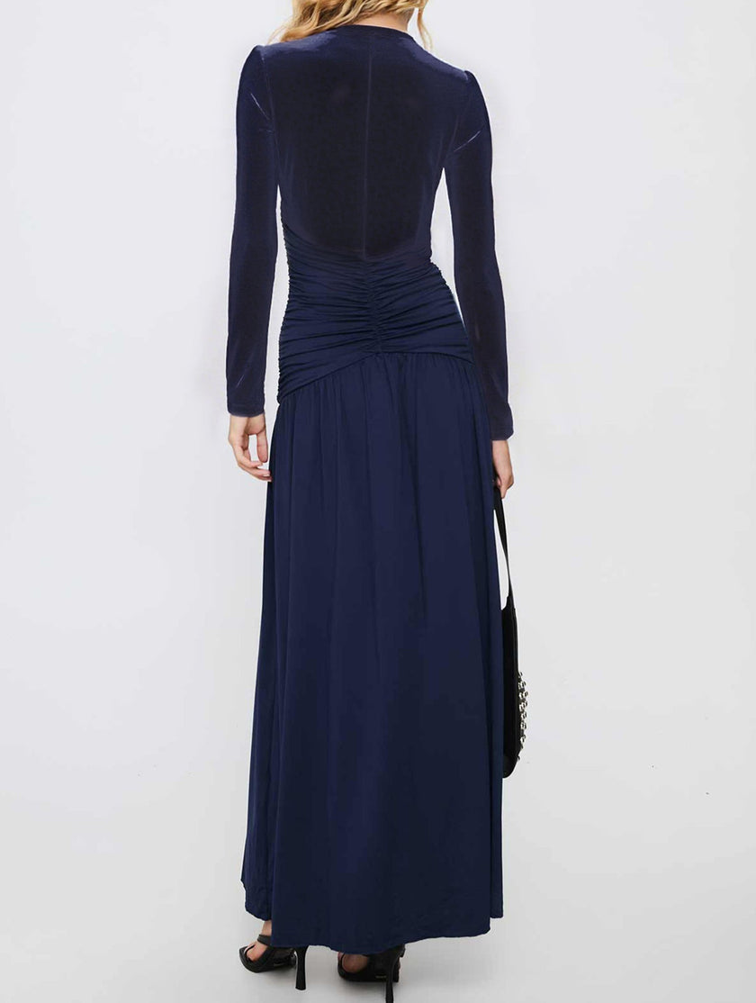 White retro deep V long sleeve maxi dress by FJØRNA, flowing design with a fitted waist and elegant silhouette.