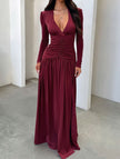 White retro deep V long sleeve maxi dress by FJØRNA, featuring a flowing silhouette and elegant design.