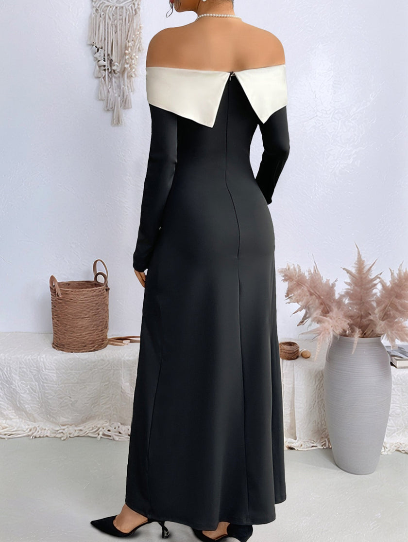 FJØRNA off-the-shoulder color-block slit dress in black and white, featuring a stylish design and elegant silhouette.