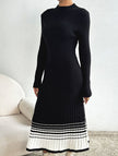 FJØRNA black and white striped pleated sweater dress, knee-length with long sleeves and a fitted silhouette.
