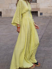 FJØRNA floral loose V-neck waist dress in white with yellow floral pattern, lightweight and breezy for casual wear.