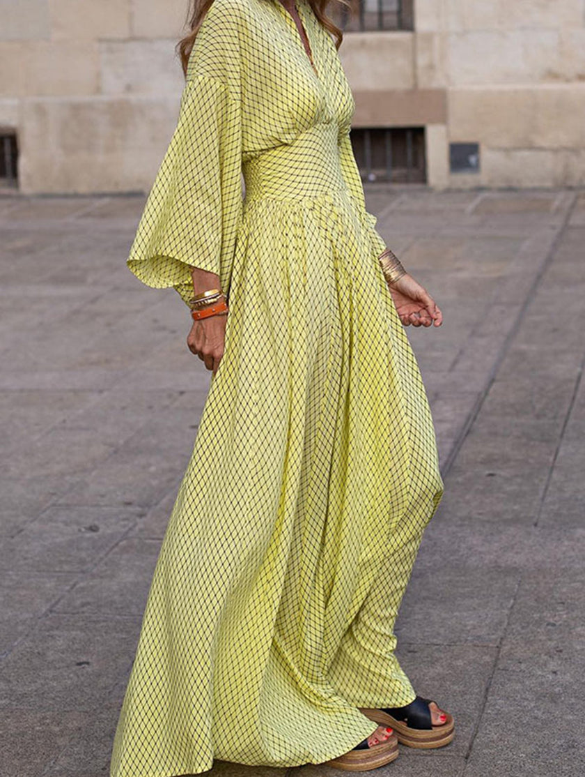 FJØRNA floral loose V-neck waist dress in white with yellow floral pattern, lightweight and breezy for casual wear.