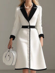 White high waist slimming three-quarter sleeve dress by FJØRNA, showcased on a model highlighting its fit and elegant design.