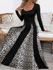 Black retro high waist leopard print patchwork dress by FJØRNA, featuring bold animal print and vintage-inspired design.