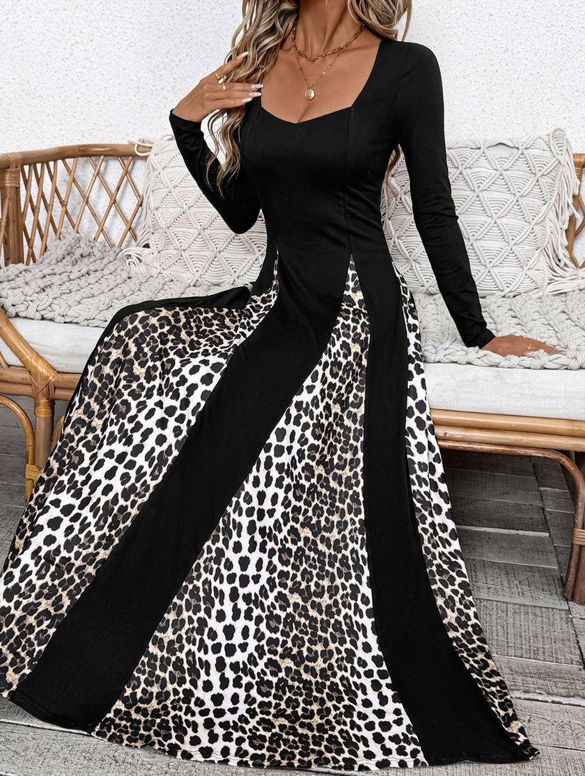 Black retro high waist leopard print patchwork dress by FJØRNA, featuring bold animal print and vintage-inspired design.