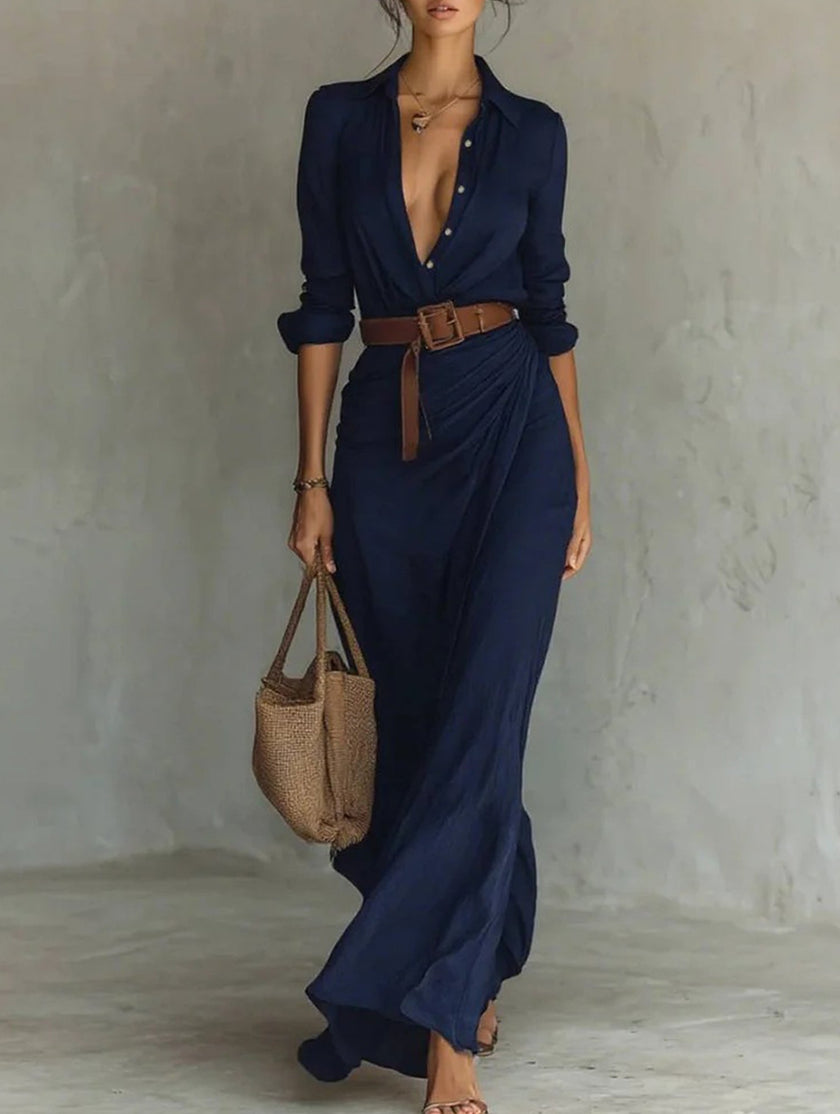 Navy solid color irregular pleated dress by FJØRNA, featuring a stylish, flowy design and unique pleated details.