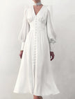 FJØRNA retro white V-neck waist dress, stylish and elegant, shown on a model with a fitted silhouette and classic design.