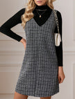 FJØRNA sleeveless white midi dress with suspenders and V-neck, stylish and elegant for casual or semi-formal occasions.