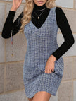 FJØRNA sleeveless white midi dress with suspenders and V-neck, featuring a stylish and elegant design.