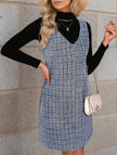 FJØRNA sleeveless white midi dress with suspenders and V-neck, elegant and stylish for casual or semi-formal occasions.