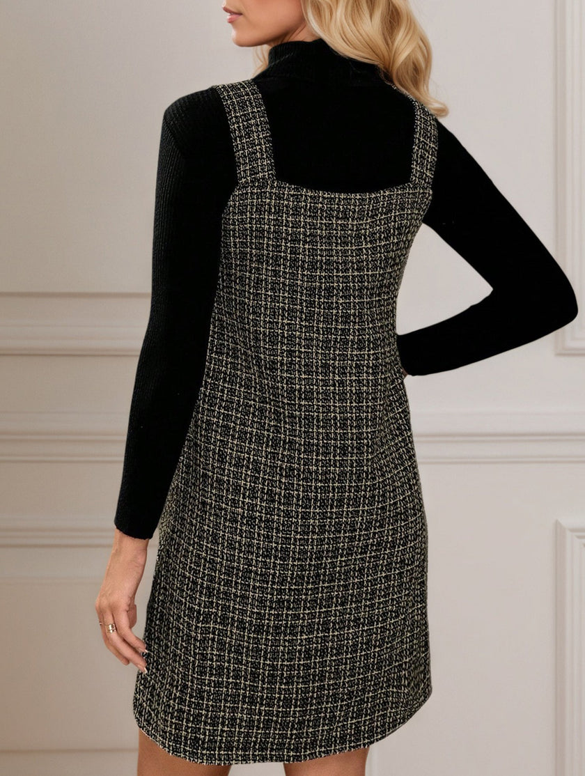 White FJØRNA sleeveless midi dress with suspenders and V-neck, featuring a stylish and elegant design.