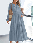 FJØRNA blue-grey V-neck pleated waist tiered long-sleeved dress, elegant and flowy for stylish occasions.