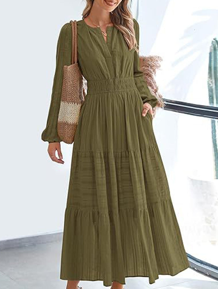 FJØRNA white V-neck pleated waist tiered long-sleeved dress, elegant and flowy with a classic design and tiered skirt detail.