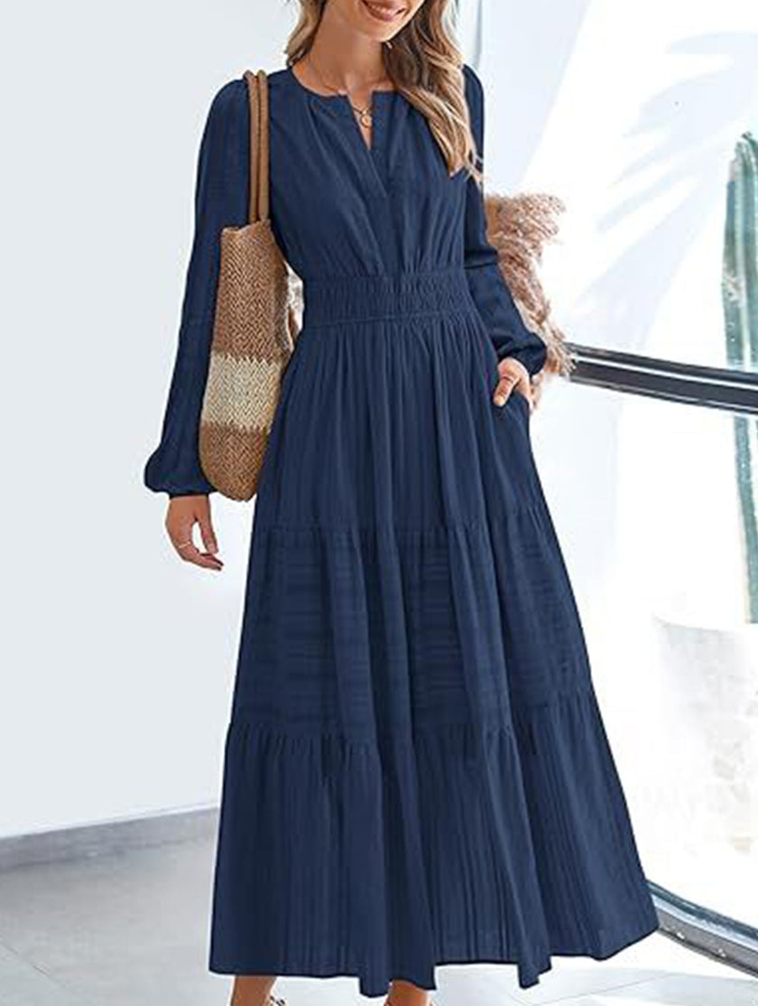 FJØRNA V-neck pleated waist tiered long-sleeved white dress, stylish and elegant for versatile occasions.