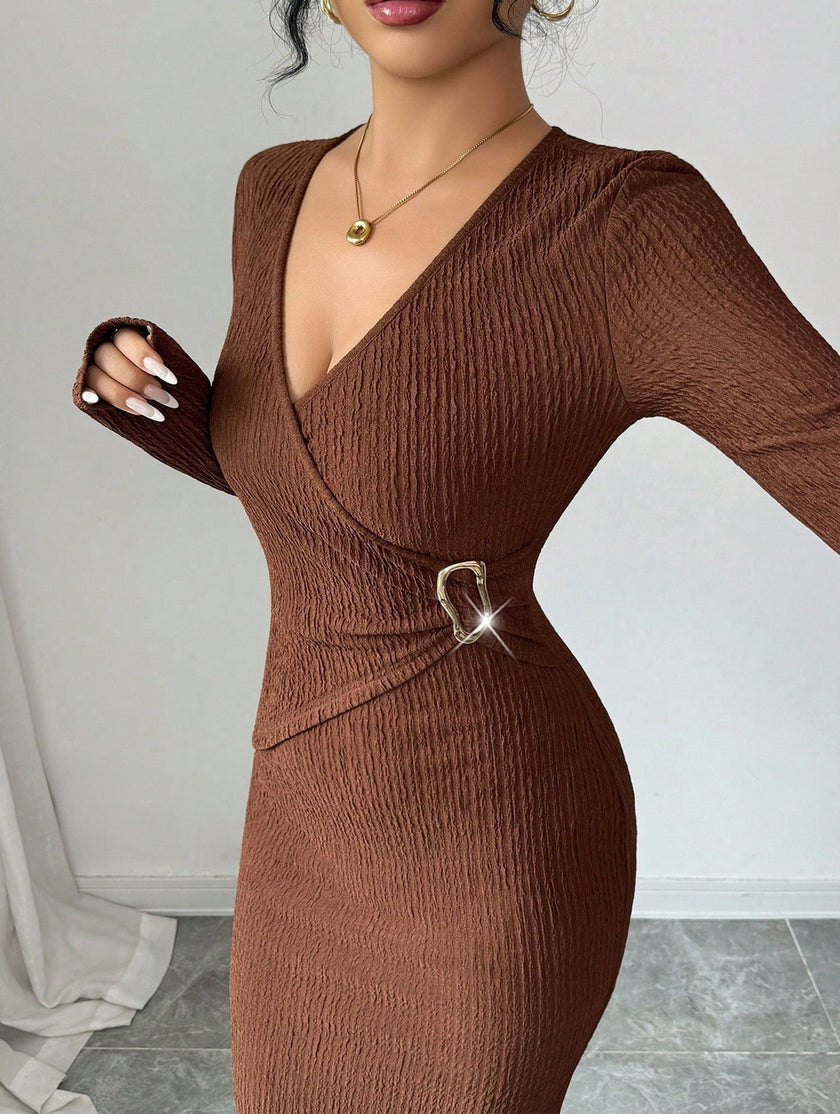 White cross neck knit slim-fit dress by FJØRNA, shown on a model, highlighting its stylish design and fitted silhouette.