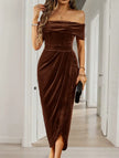 FJØRNA white strapless bodycon maxi dress displayed on a hanger, showcasing its sleek, fitted design and elegant style.
