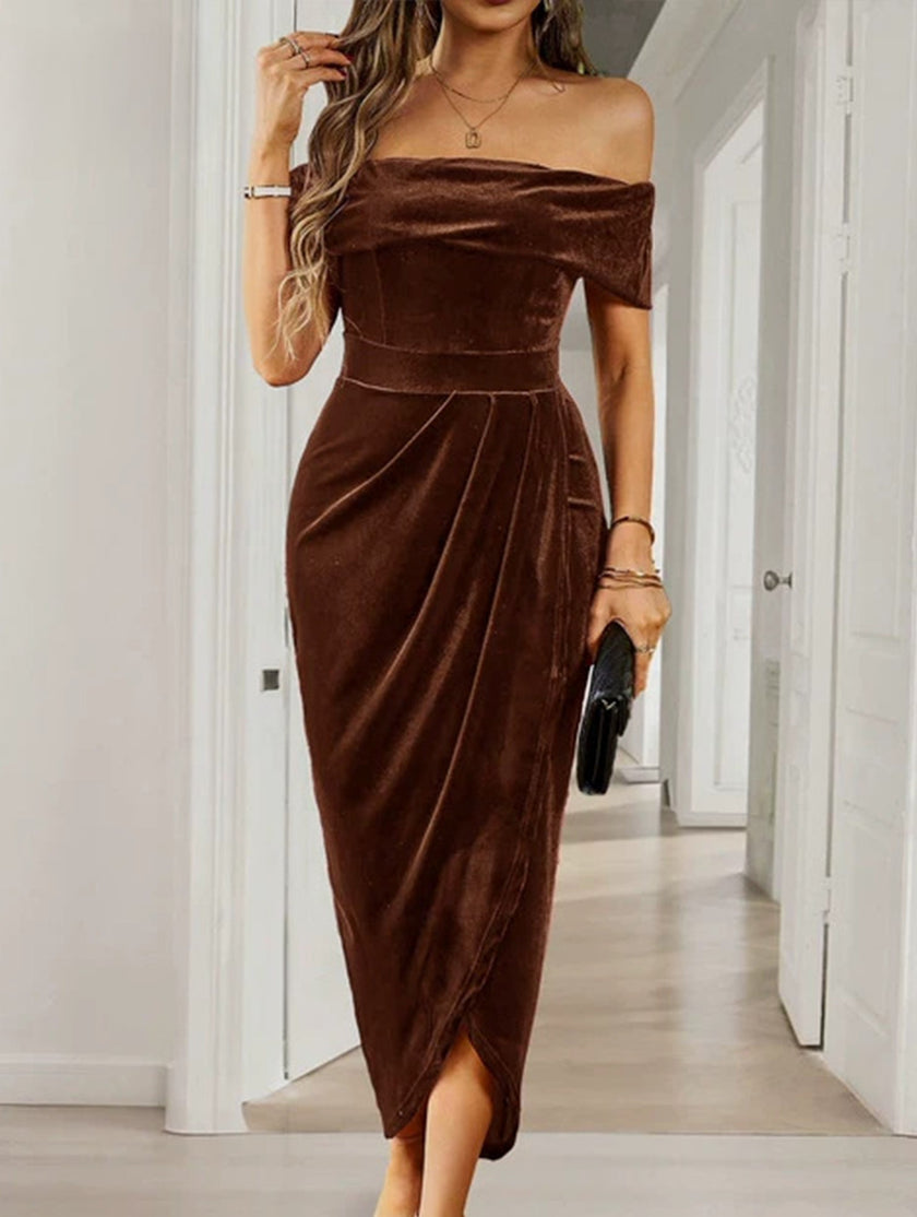 FJØRNA white strapless bodycon maxi dress displayed on a hanger, showcasing its sleek, fitted design and elegant style.