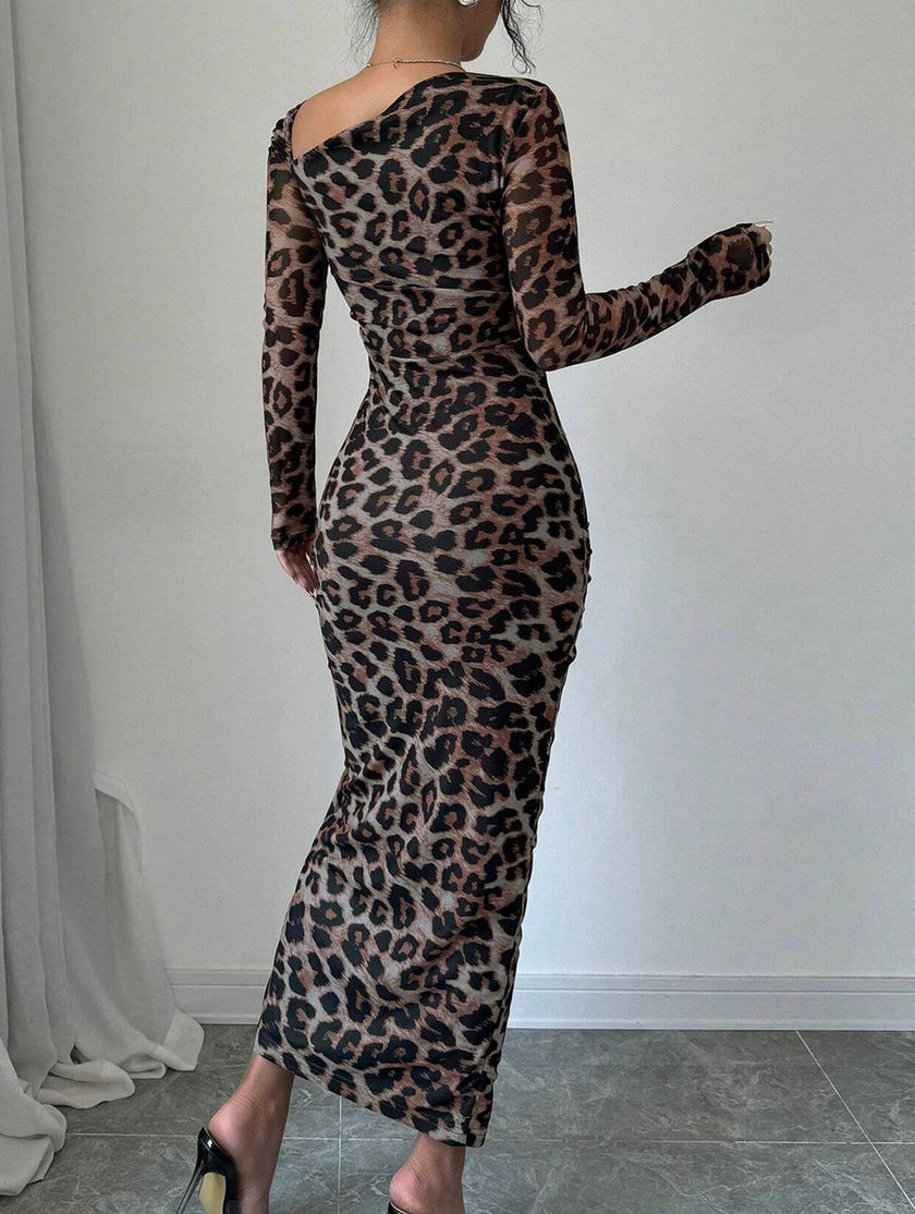 FJØRNA retro leopard print bodycon dress in black, featuring fitted silhouette and bold animal print fabric.