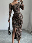 FJØRNA retro leopard print bodycon dress displayed on a hanger, showcasing its bold black and brown animal print design.