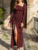 FJØRNA retro leopard print bodycon dress, red and black pattern, form-fitting dress with long sleeves and stylish design.
