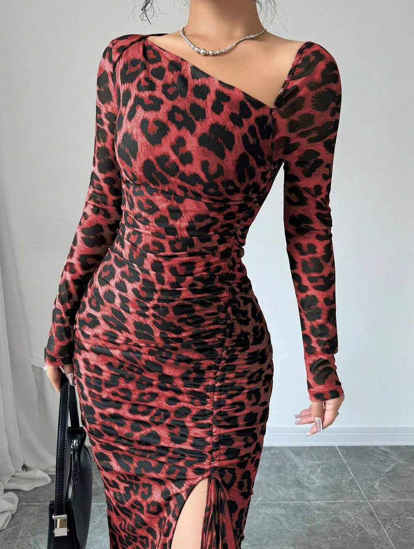 FJØRNA retro leopard print bodycon dress, red and black pattern, fitted style, showcasing its bold, stylish design.