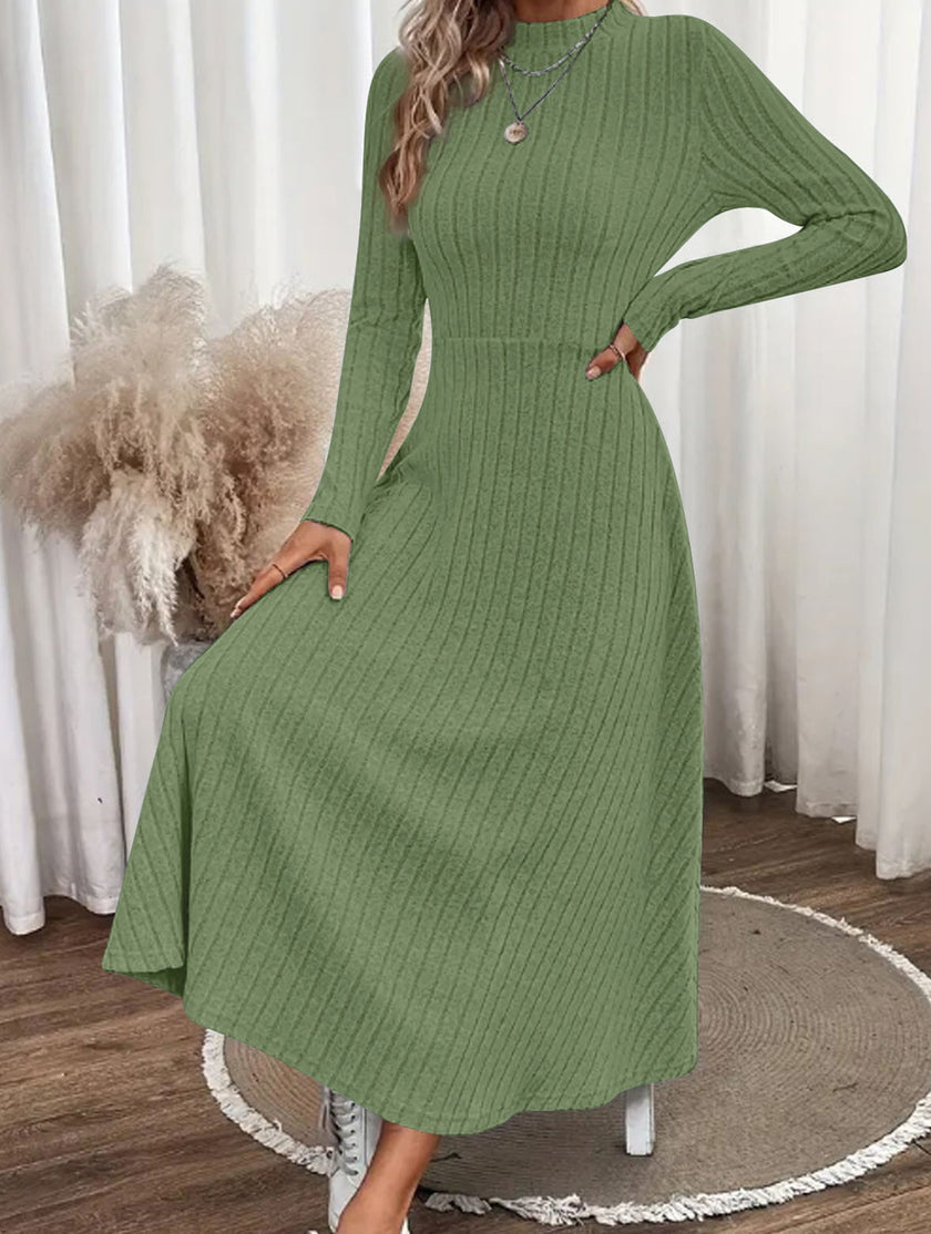 FJØRNA white round neck brushed ribbed long dress, casual and comfortable, shown on a hanger.