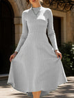 FJØRNA round neck brushed ribbed long white dress, casual and comfortable, shown on a model.