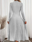 FJØRNA white round neck brushed ribbed long dress laid flat, showcasing its soft texture and simple elegant design.