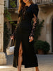 Black FJØRNA openwork dress with lace slit and cinched waist, featuring a stylish, figure-enhancing design and intricate lace details.