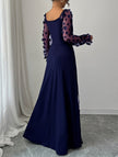 White FJØRNA retro hollowed-out long-sleeved dress, stylish and vintage-inspired with intricate cut-out details.