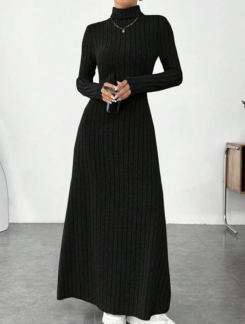 Black ribbed brushed long-sleeved dress by FJØRNA, featuring a solid color and fitted silhouette.