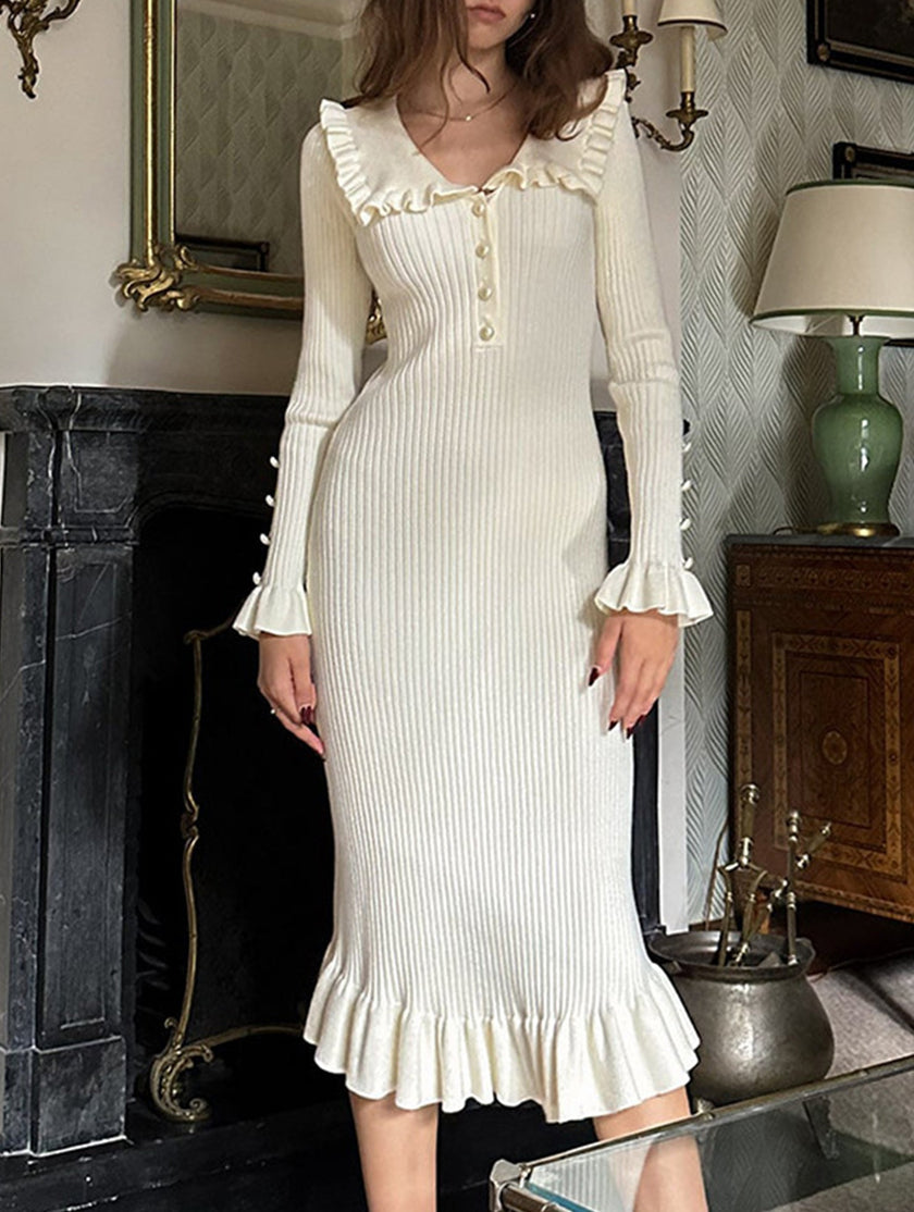 White retro ruffled knit dress by FJØRNA featuring a vintage-inspired design and textured fabric.