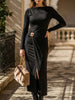 Black patchwork mesh dress with metal buckle detail by FJØRNA, featuring a stylish and contemporary design.