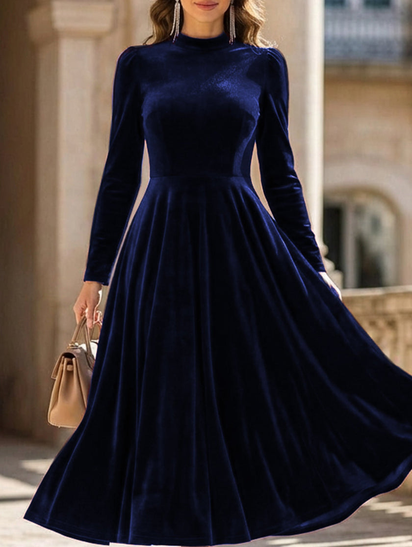 FJØRNA velvet round neck long-sleeved white dress displayed on a hanger, showcasing its elegant fabric and simple design.