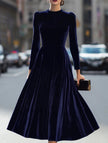 FJØRNA velvet long-sleeved round neck dress in navy, showcasing a smooth fabric and elegant fit.