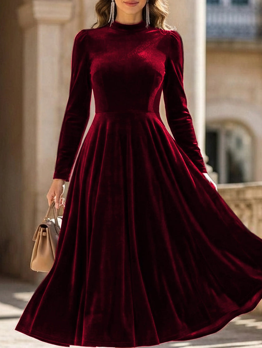 White velvet round neck long-sleeved dress by FJØRNA, featuring a stylish and elegant design.