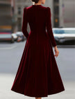 FJØRNA velvet long-sleeved white dress with round neckline, close-up of fabric and elegant fit for stylish occasions.