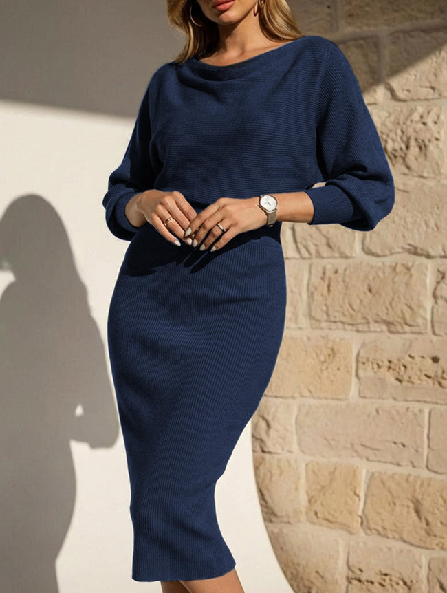 White FJØRNA slim fit knit dress with elegant design, featuring a fitted silhouette and stylish neckline, perfect for versatile occasions.