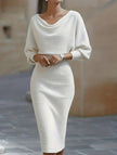 White FJØRNA slim fit knit dress, elegant and stylish, showcasing a close-up of the fitted design and soft fabric.