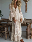 White lace bell-sleeve long dress by FJØRNA featuring resort-style design and elegant flowing silhouette.