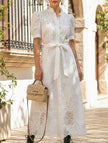 White FJØRNA pastoral style openwork embroidered dress with delicate embroidery and flowy fabric, perfect for spring and summer wear.