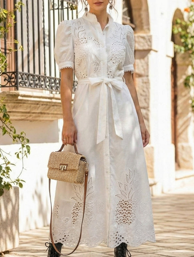 White FJØRNA pastoral style openwork embroidered dress with delicate embroidery and flowy fabric, perfect for spring and summer wear.
