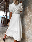 White FJØRNA pastoral style openwork embroidered dress with intricate lace and floral details, perfect for elegant occasions.