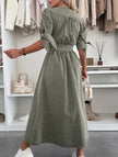 White FJØRNA deep V-neck fitted shirt dress with long sleeves, tailored style, and button front for a chic, modern look.