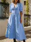 FJØRNA white fitted shirt dress with a deep V-neck, slim silhouette, long sleeves, and classic collar, shown on a model.
